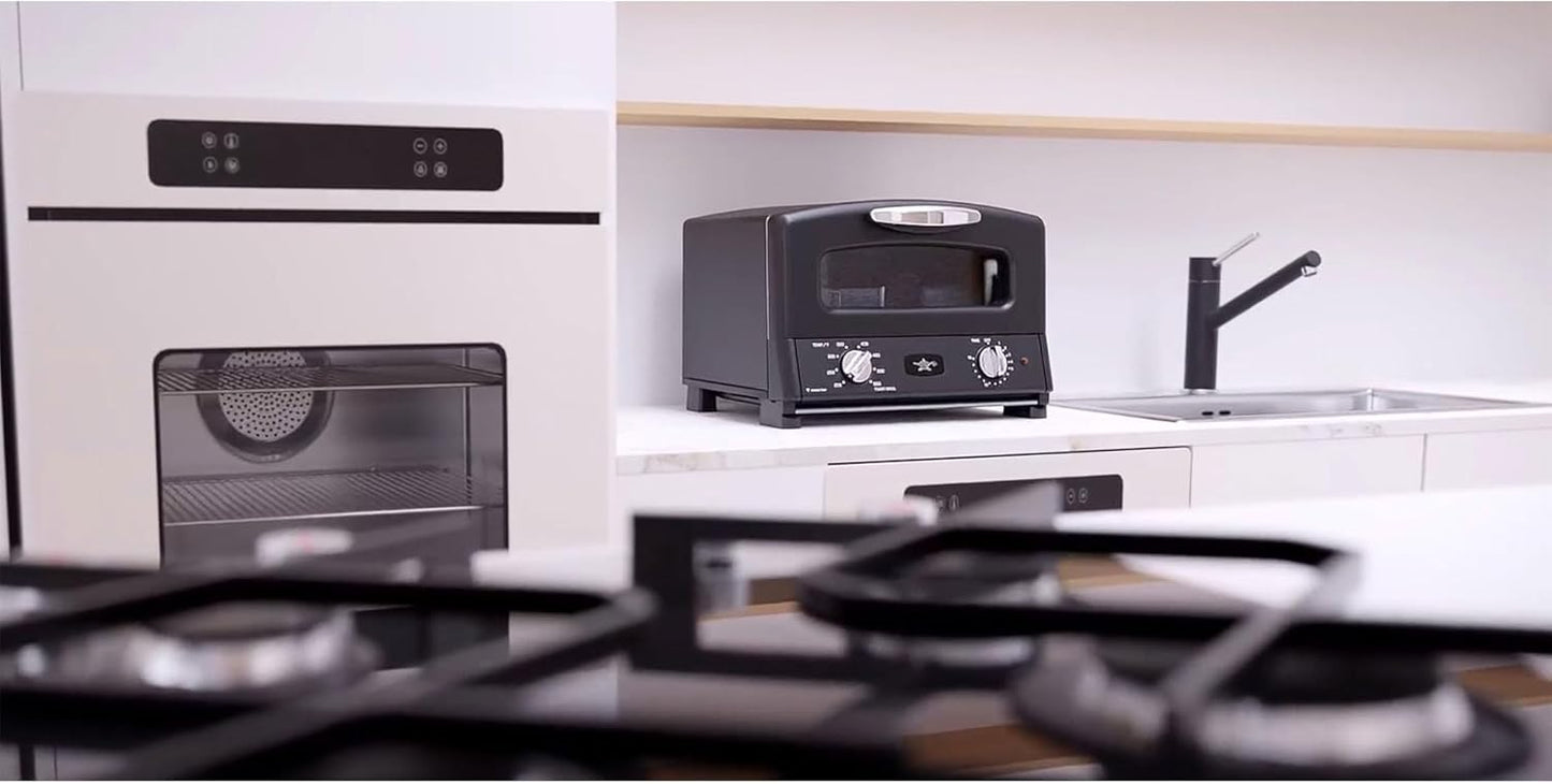 Black HeatMate Graphite Pop-Up Toaster with 7 Heat Settings, 3 Toasting Functions, and Bagel Mode