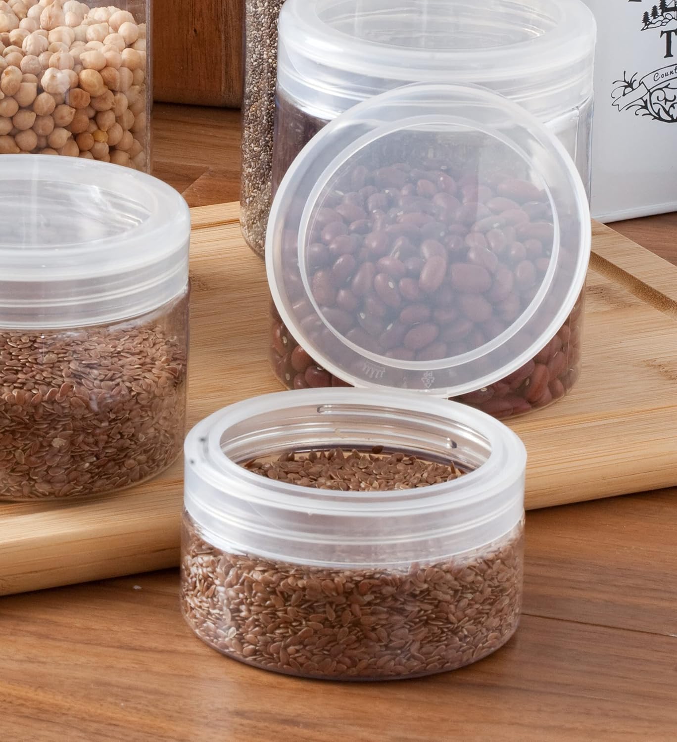 6 Pack of JUVITUS 8 oz Clear PET Plastic Low Profile Jars with Natural Flip Tops - BPA Free and Refillable