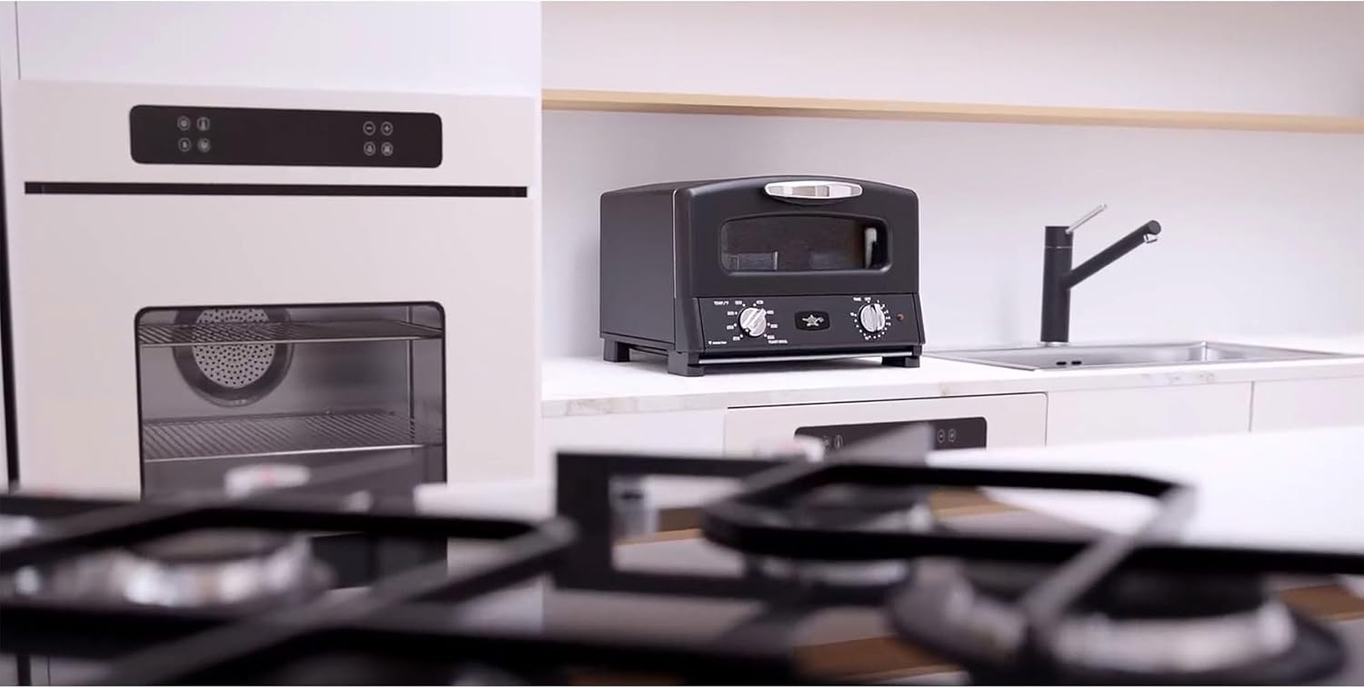 Black HeatMate Graphite Pop-Up Toaster with 7 Heat Settings, 3 Toasting Functions, and Bagel Mode