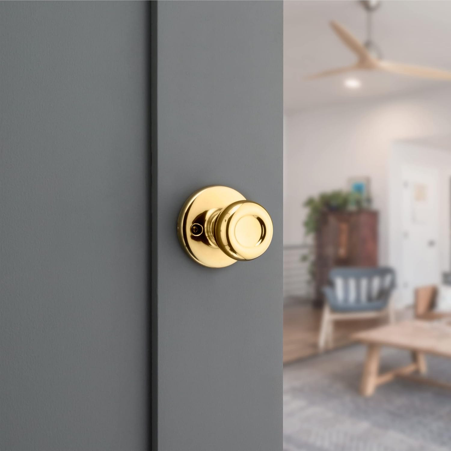 Kwikset Tylo Interior Passage Door Knob in Polished Brass for Closet and Hallway Doors