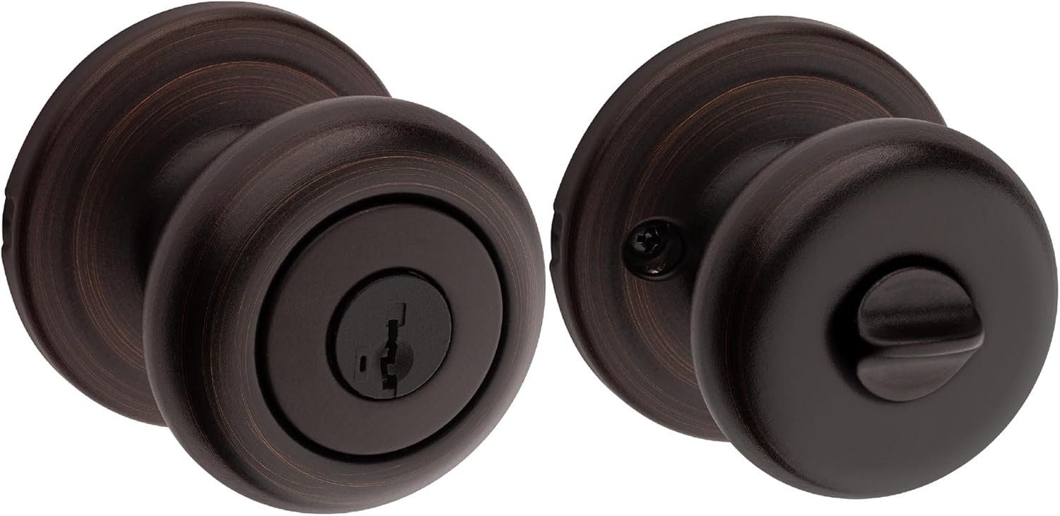 Secure your front entrance and bedroom with the Kwikset Juno Entry Door Knob in Venetian Bronze, featuring a pick-resistant SmartKey rekey system and Microban technology.