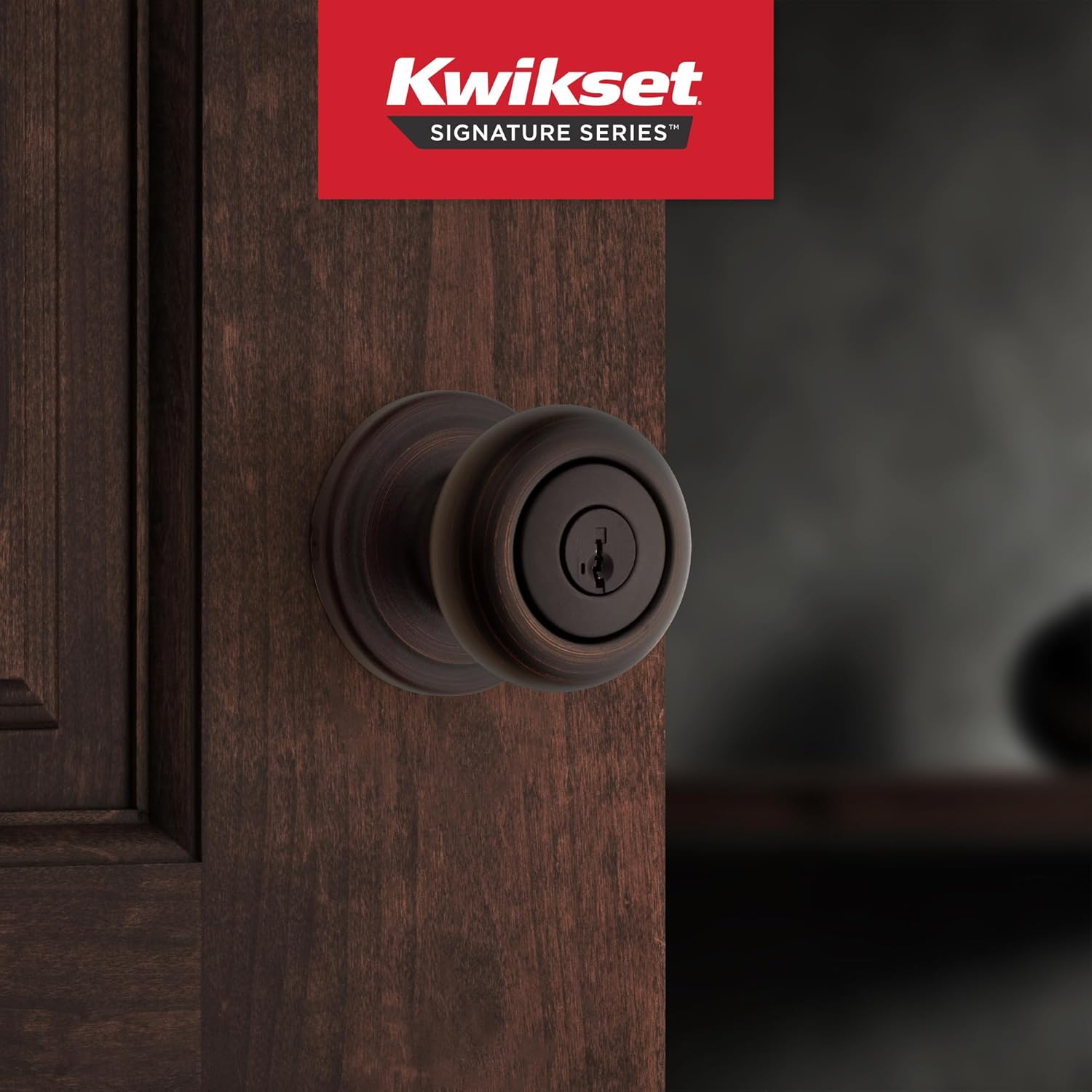 Secure your front entrance and bedroom with the Kwikset Juno Entry Door Knob in Venetian Bronze, featuring a pick-resistant SmartKey rekey system and Microban technology.