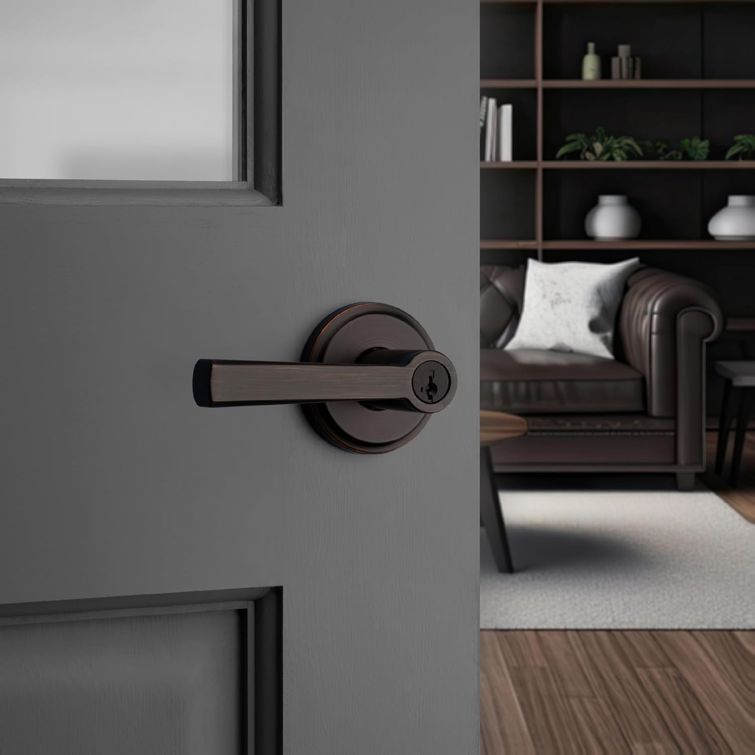 Secure your front entrance and bedrooms with the Kwikset Trafford Entry Door Handle in Venetian Bronze, featuring a pick-resistant SmartKey lock and Microban technology.