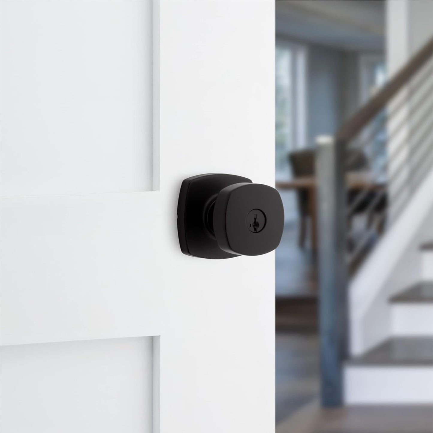 Secure your home with the Kwikset Arroyo Knob Entry Door Lock and Key in Matte Black, featuring SmartKey Rekey Security and Microban technology for added protection. Perfect for front entrances and bedrooms.