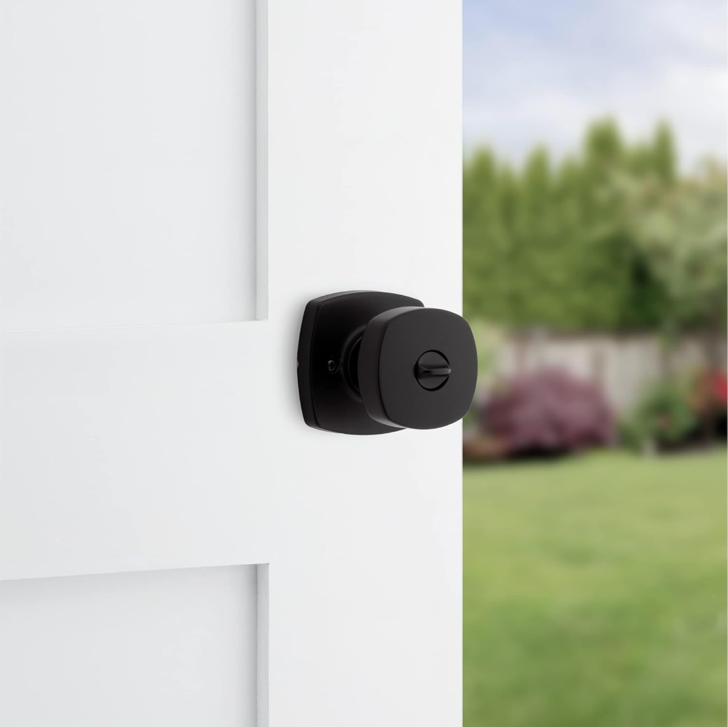 Secure your home with the Kwikset Arroyo Knob Entry Door Lock and Key in Matte Black, featuring SmartKey Rekey Security and Microban technology for added protection. Perfect for front entrances and bedrooms.