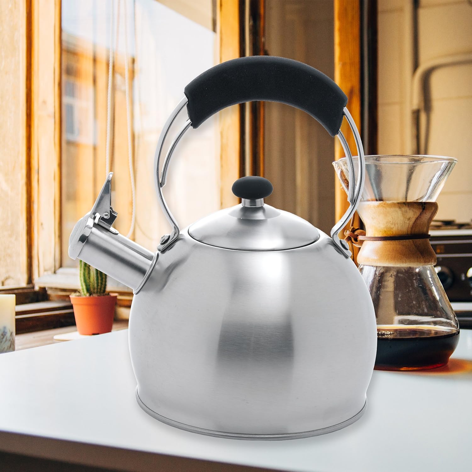 Stainless Steel Stovetop Tea Kettle with Whistling Spout and Even Heat Distribution for Home Brewing